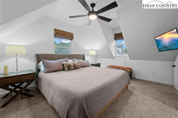 a spacious bathroom with a sink and a mirror