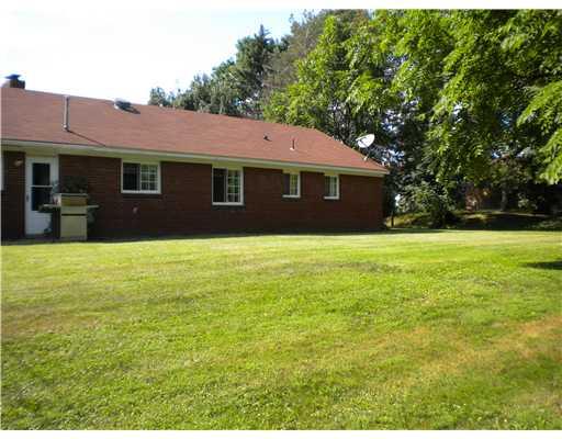 180 Bradys Ridge Road Beaver, PA 15009 - Photo 9 of 10 Exterior Back. Level Back Yard is Great for Entertaining, Cookouts, and Volley Ball.