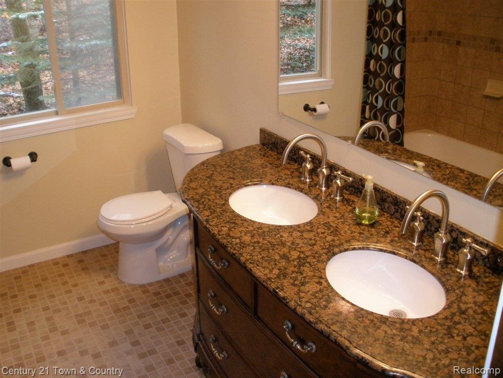 5560 Delmas Road Clarkston, MI 48348 - Photo 9 of 16 Just look at this new bathroom!