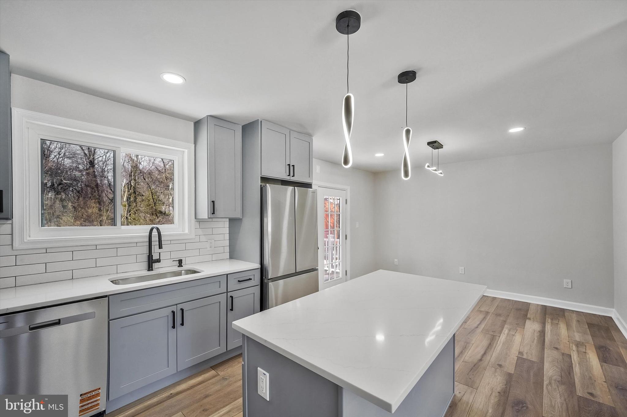 3629 Parklane Road Fairfax, VA 22030 - Photo 11 of 45 a kitchen with refrigerator and window