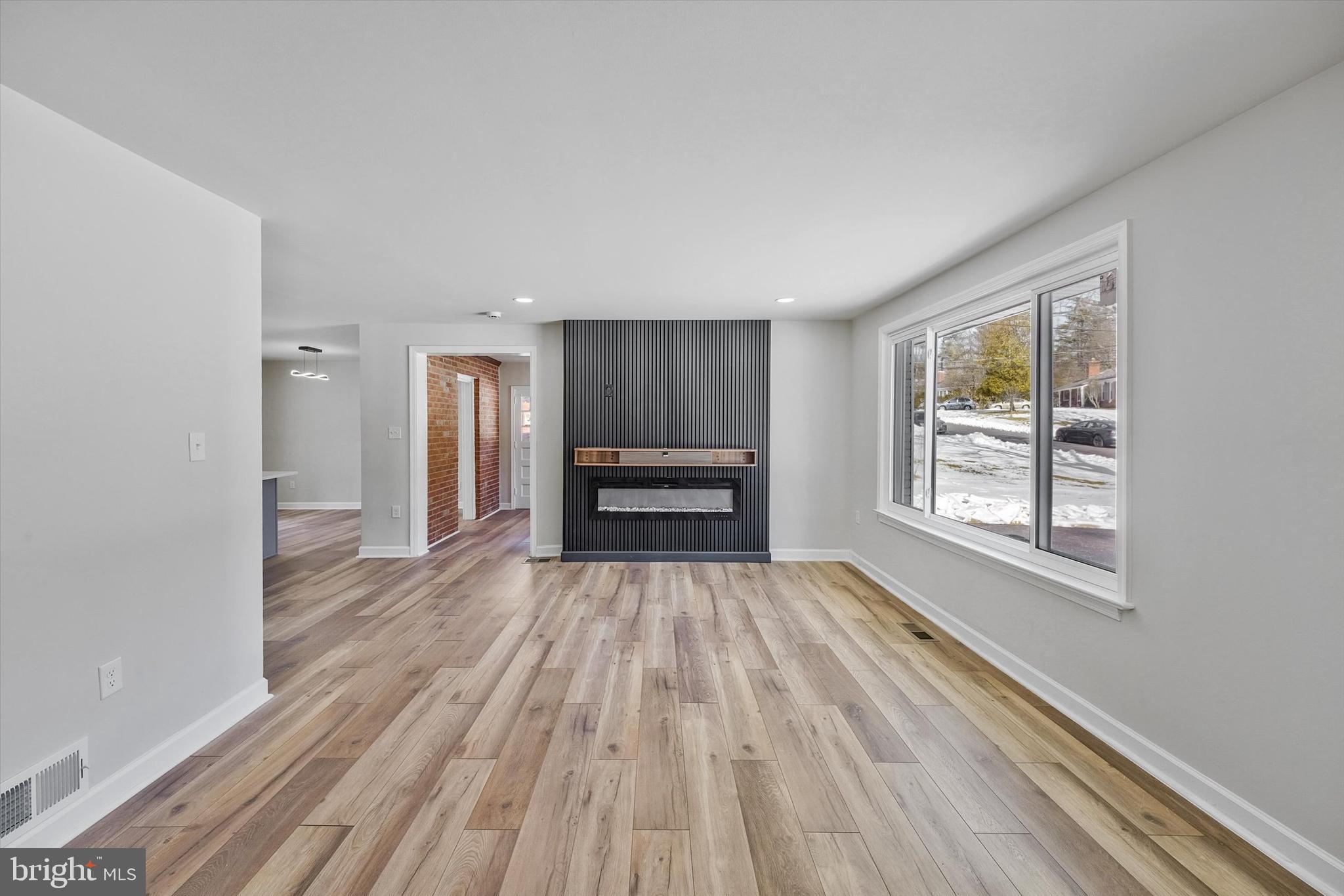 3629 Parklane Road Fairfax, VA 22030 - Photo 15 of 45 wooden floor in an empty room with a window