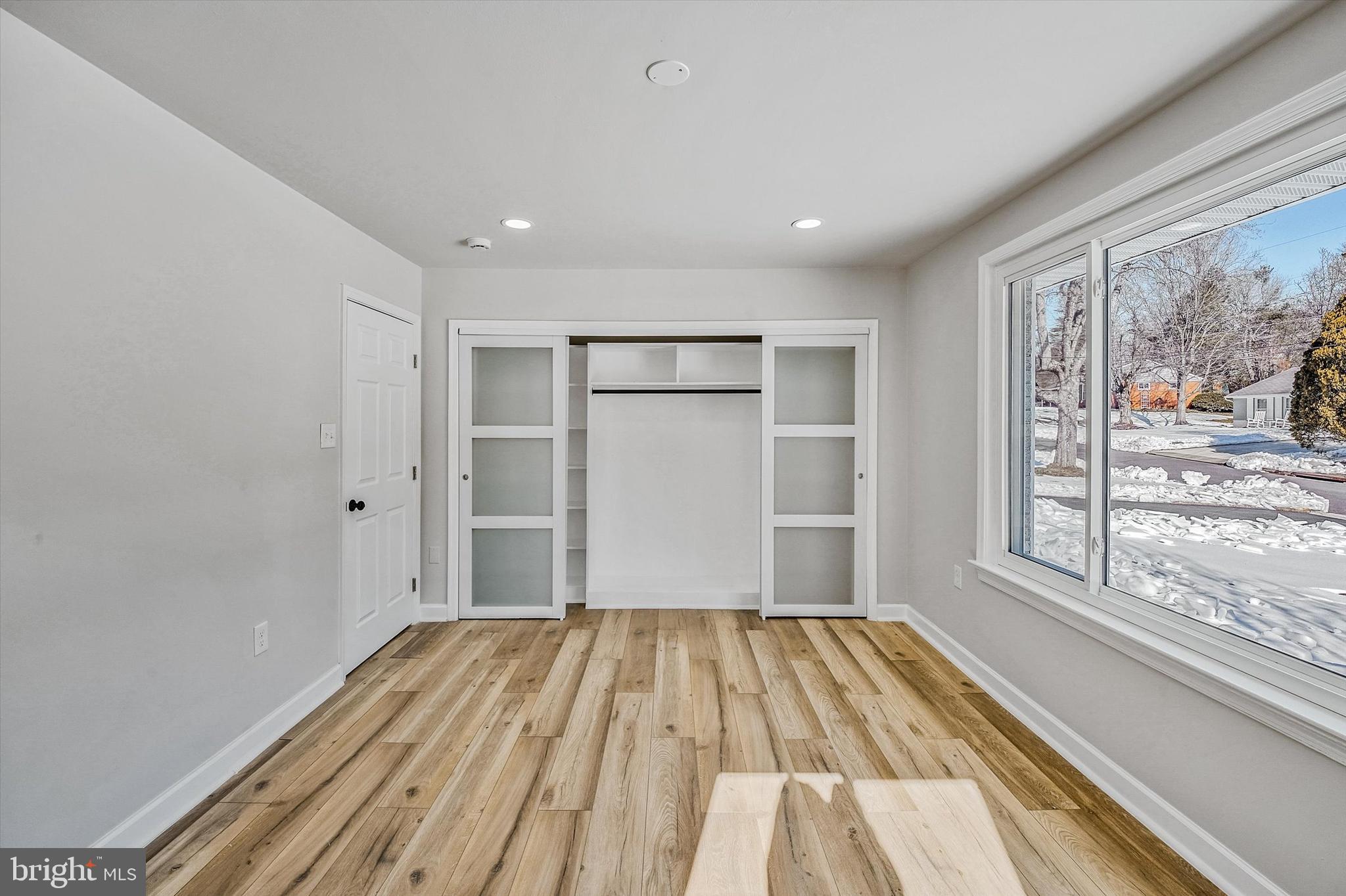 3629 Parklane Road Fairfax, VA 22030 - Photo 21 of 45 a view of a room with wooden floor and window