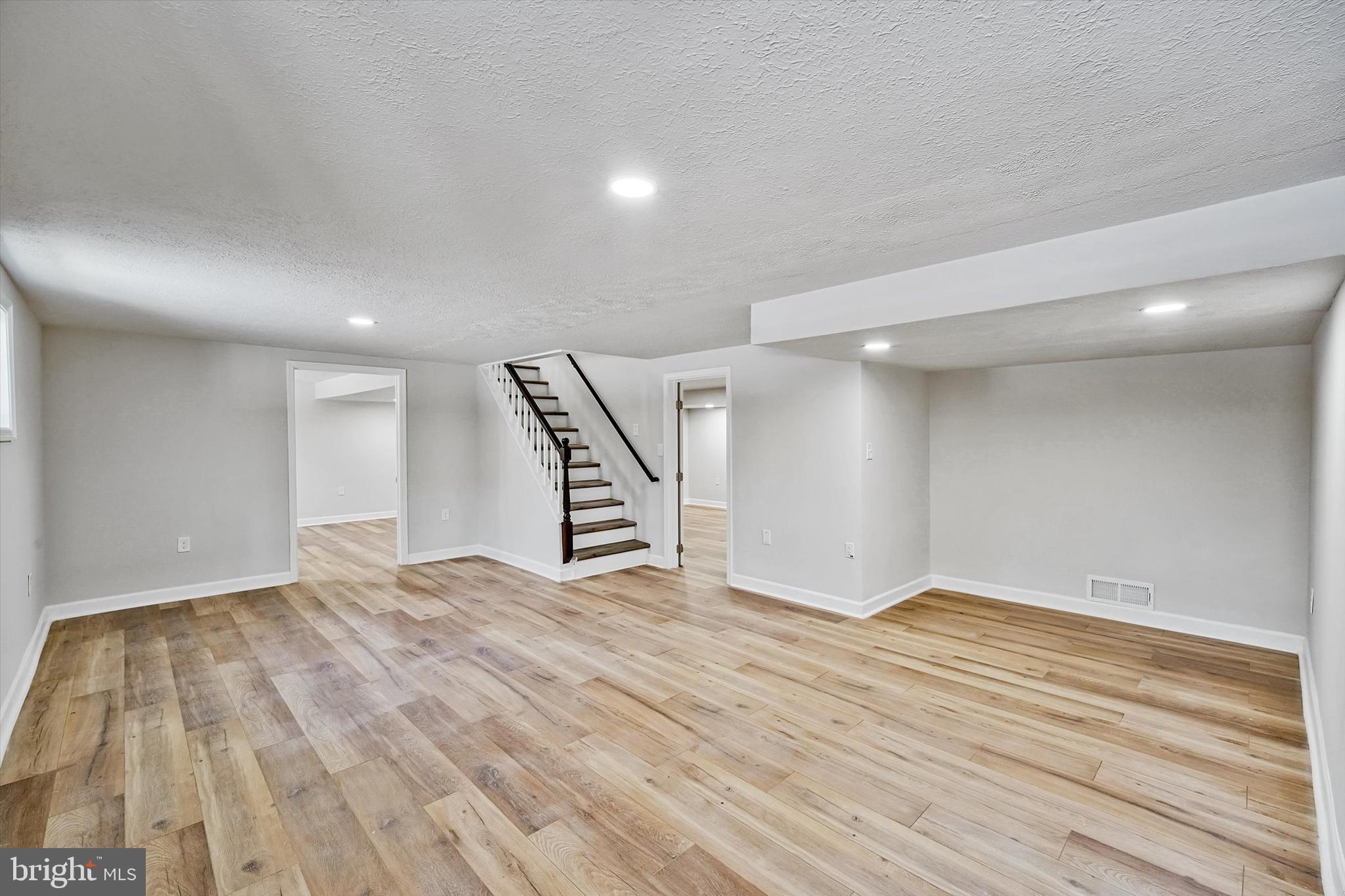 3629 Parklane Road Fairfax, VA 22030 - Photo 23 of 45 a view of an empty room with wooden floor