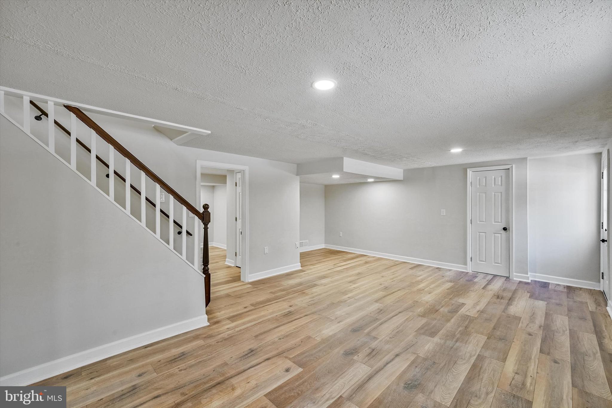 3629 Parklane Road Fairfax, VA 22030 - Photo 25 of 45 a view of an empty room with wooden floor