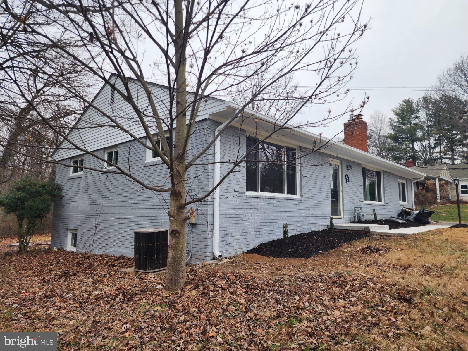 3629 Parklane Road Fairfax, VA 22030 - Photo 3 of 45 a white house that has a tree in front of it