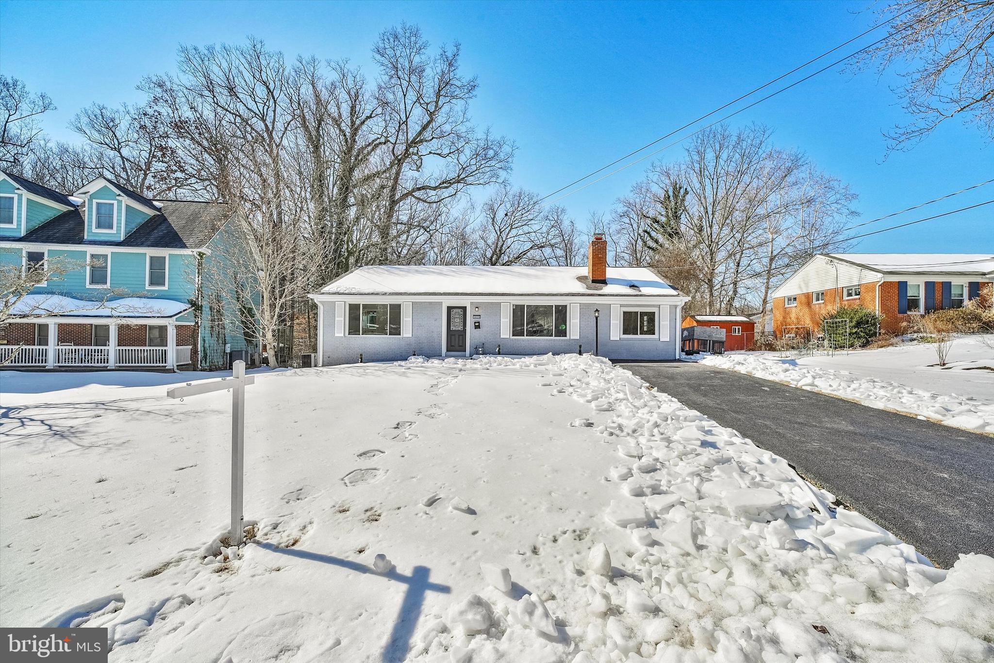 3629 Parklane Road Fairfax, VA 22030 - Photo 6 of 45 a front view of a house with a yard