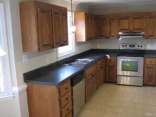2417 Basil Drive Raleigh, NC 27612 - Photo 2 of 12 Kitchen has new countertops, new tile, new appliances, new hardware, new light fixtures and new paint. Other