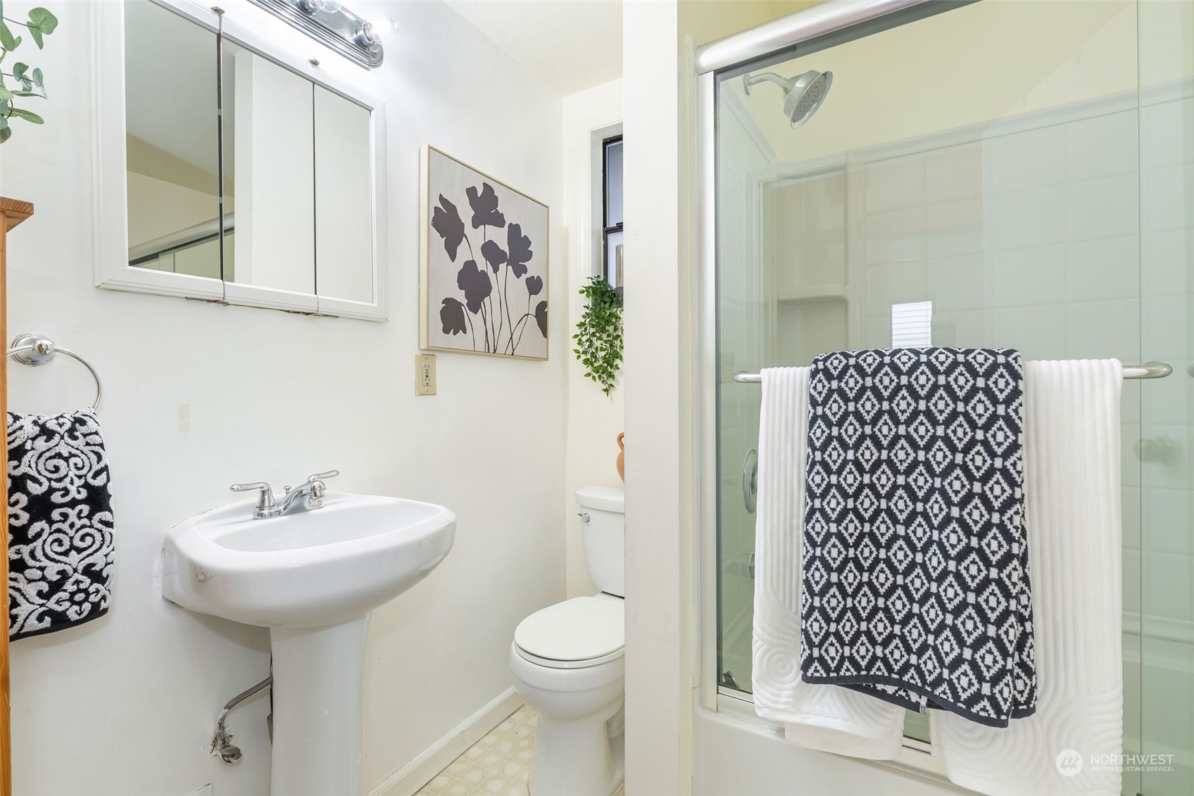 1122 26th Avenue Seattle, WA 98122 - Photo 11 of 17 a bathroom with a sink toilet and shower