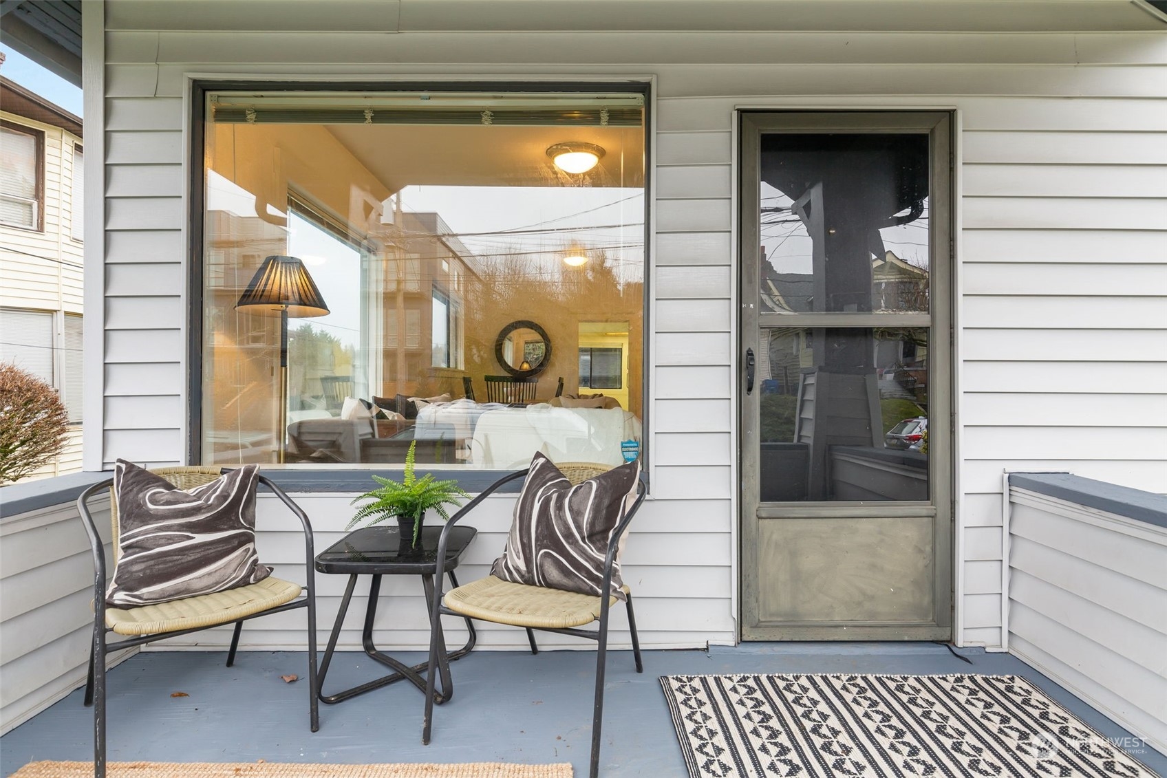 1122 26th Avenue Seattle, WA 98122 - Photo 2 of 17 a dining room with furniture and a window