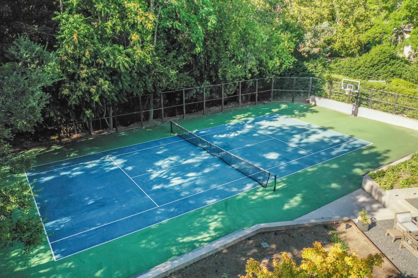 190 Bridge Road Hillsborough, CA 94010 - Photo 12 of 14 a view of a backyard with a wooden fence
