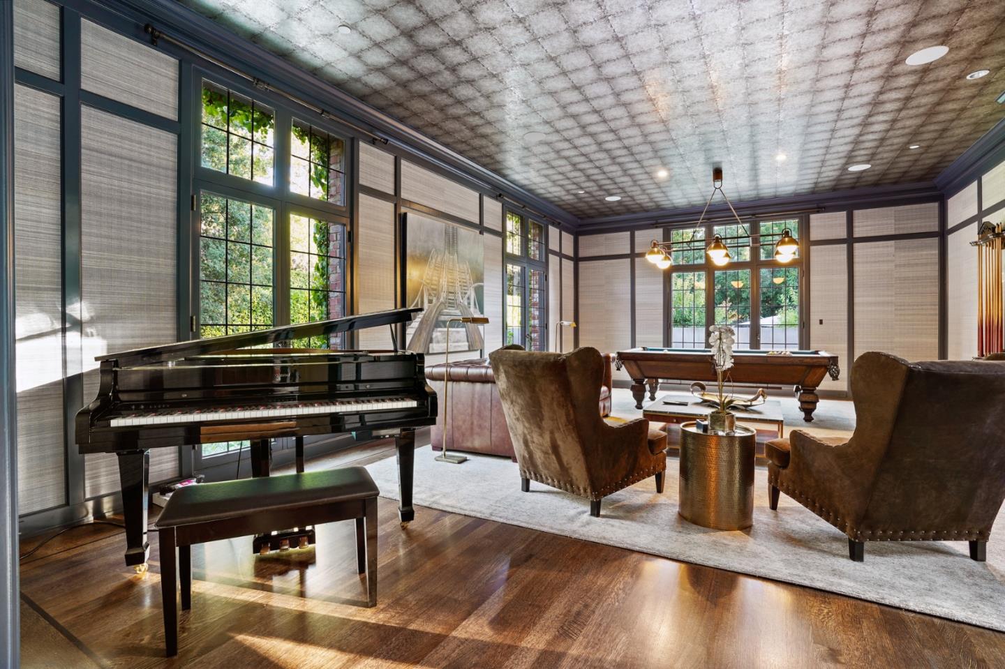 190 Bridge Road Hillsborough, CA 94010 - Photo 4 of 14 a living room with furniture a table and large windows
