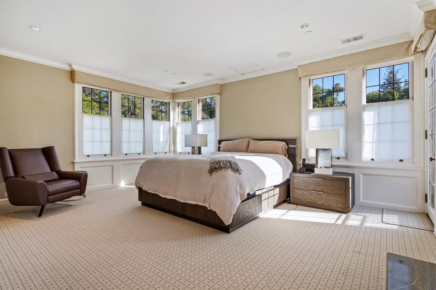 190 Bridge Road Hillsborough, CA 94010 - Photo 9 of 14 a spacious bedroom with a bed and glass window