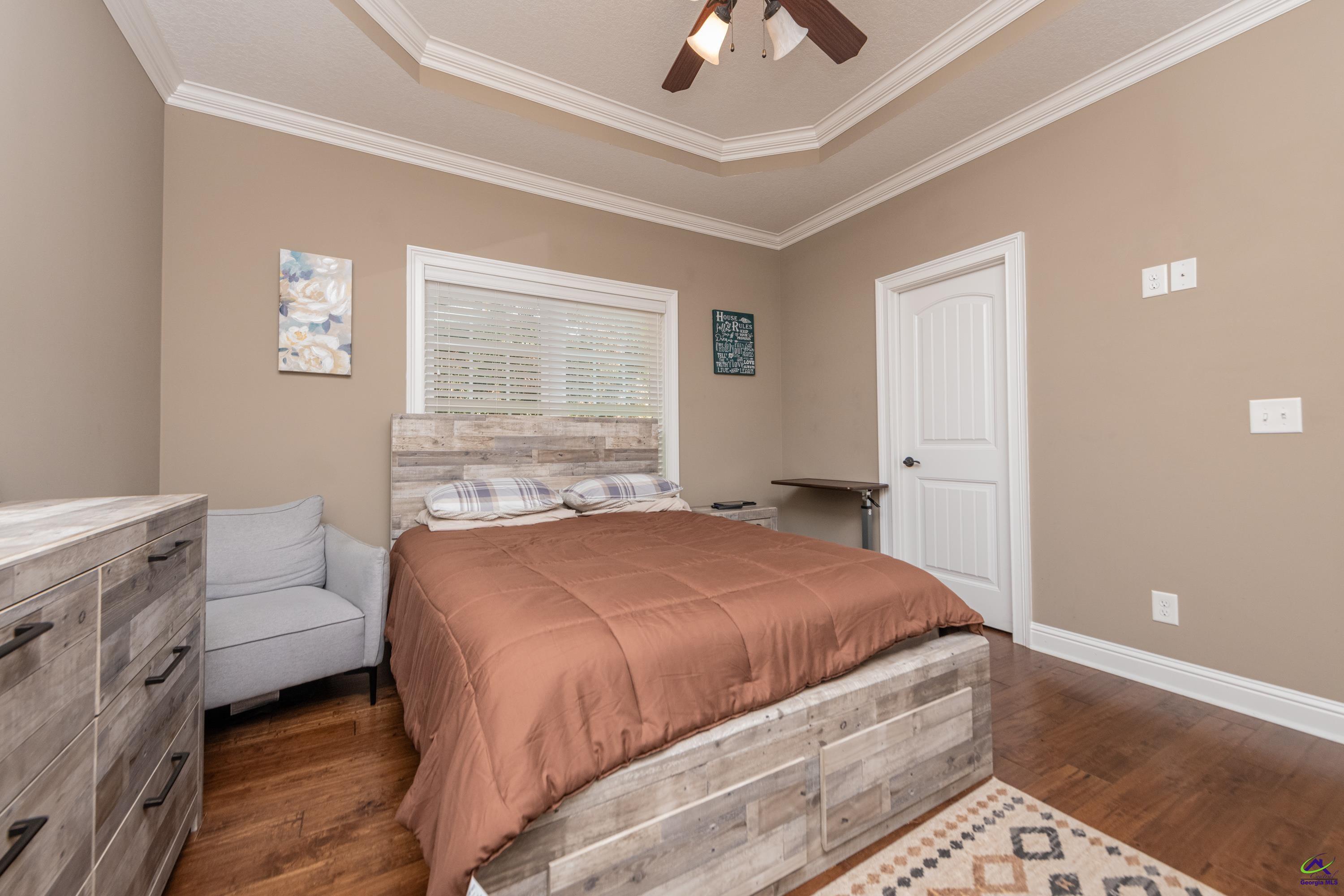 405 Old Bridge Road Warner Robins, GA 31088 - Photo 35 of 58 a bedroom with a bed and window