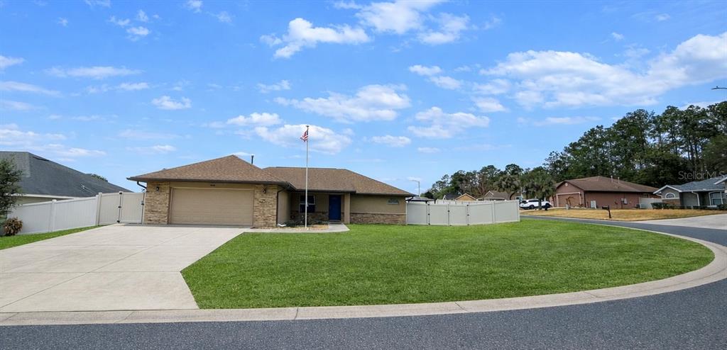 a view of a house with a yard