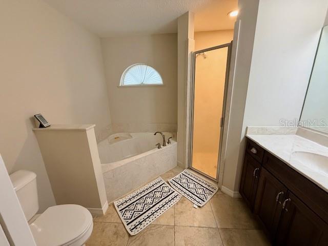 1026 Southeast 65th Circle Ocala, FL 34472 - Photo 12 of 29 a bathroom with a sink toilet and shower