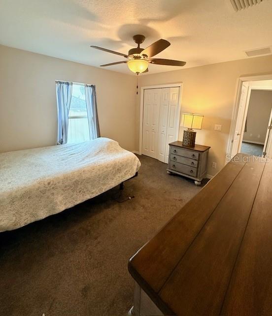 1026 Southeast 65th Circle Ocala, FL 34472 - Photo 14 of 29 a bedroom with a bed dresser and a window