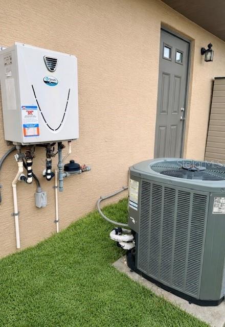 1026 Southeast 65th Circle Ocala, FL 34472 - Photo 28 of 29 a front view of a house with garden