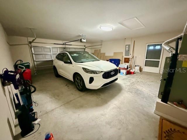 1026 Southeast 65th Circle Ocala, FL 34472 - Photo 29 of 29 a car parked in a garage