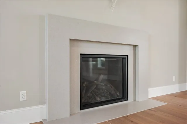 a stove top oven sitting inside of a kitchen