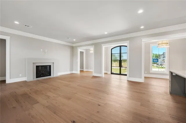 a kitchen with kitchen island a sink stainless steel appliances and cabinets