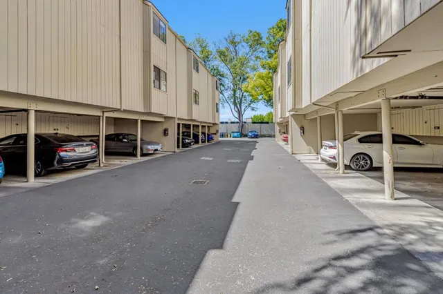 a view of a street with cars