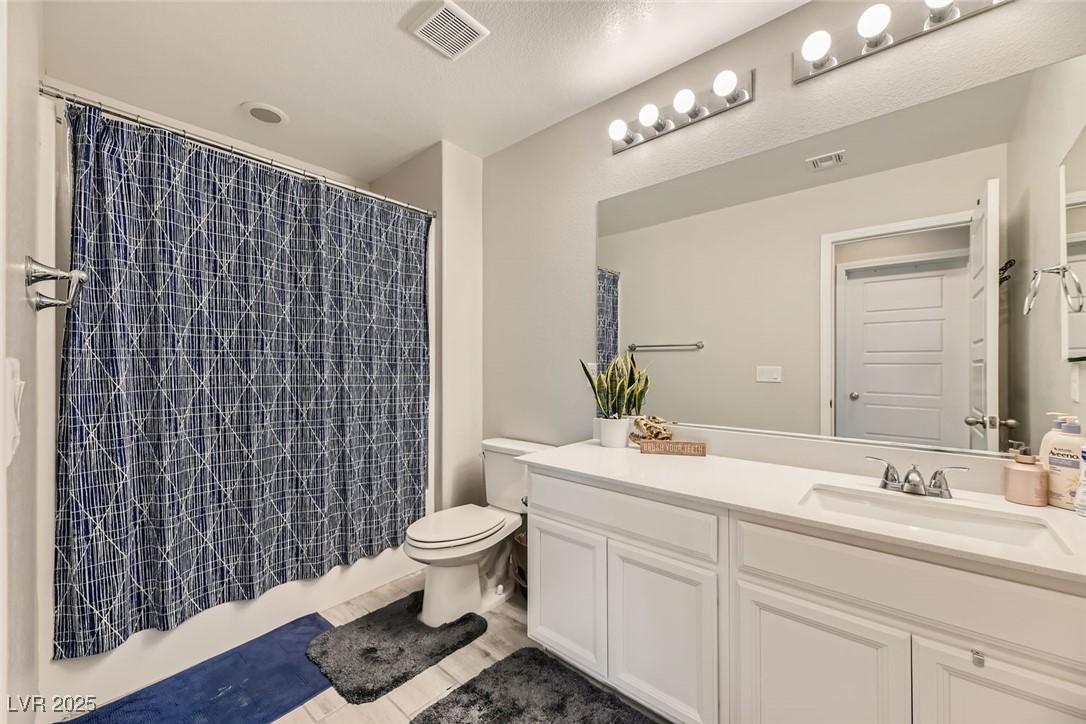 10558 El Camino Road Las Vegas, NV 89141 - Photo 9 of 11 Upstairs Bathroom