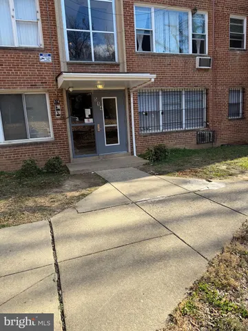 a front view of a house with a garage