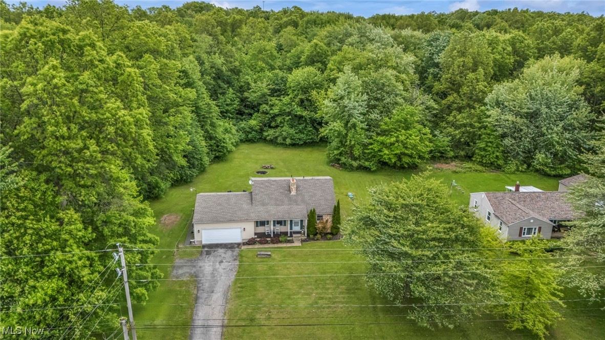 View from above of property featuring 10.17 Acres of Land with Woods