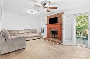 a view of empty room with a fireplace