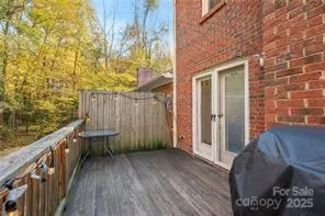 a view of a patio with a table and chairs