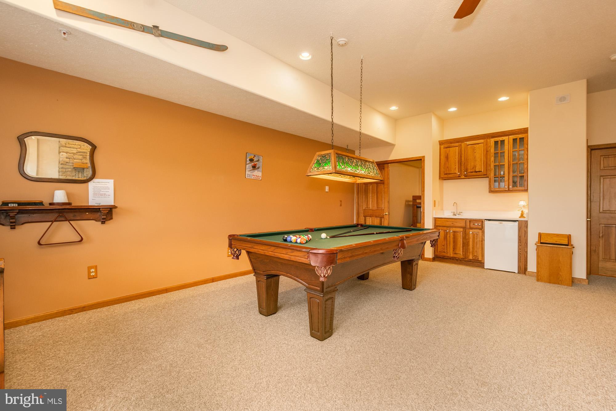 750 Wisp Mountain Road, Unit B McHenry, MD 21541 - Photo 23 of 49 a room with pool table and windows
