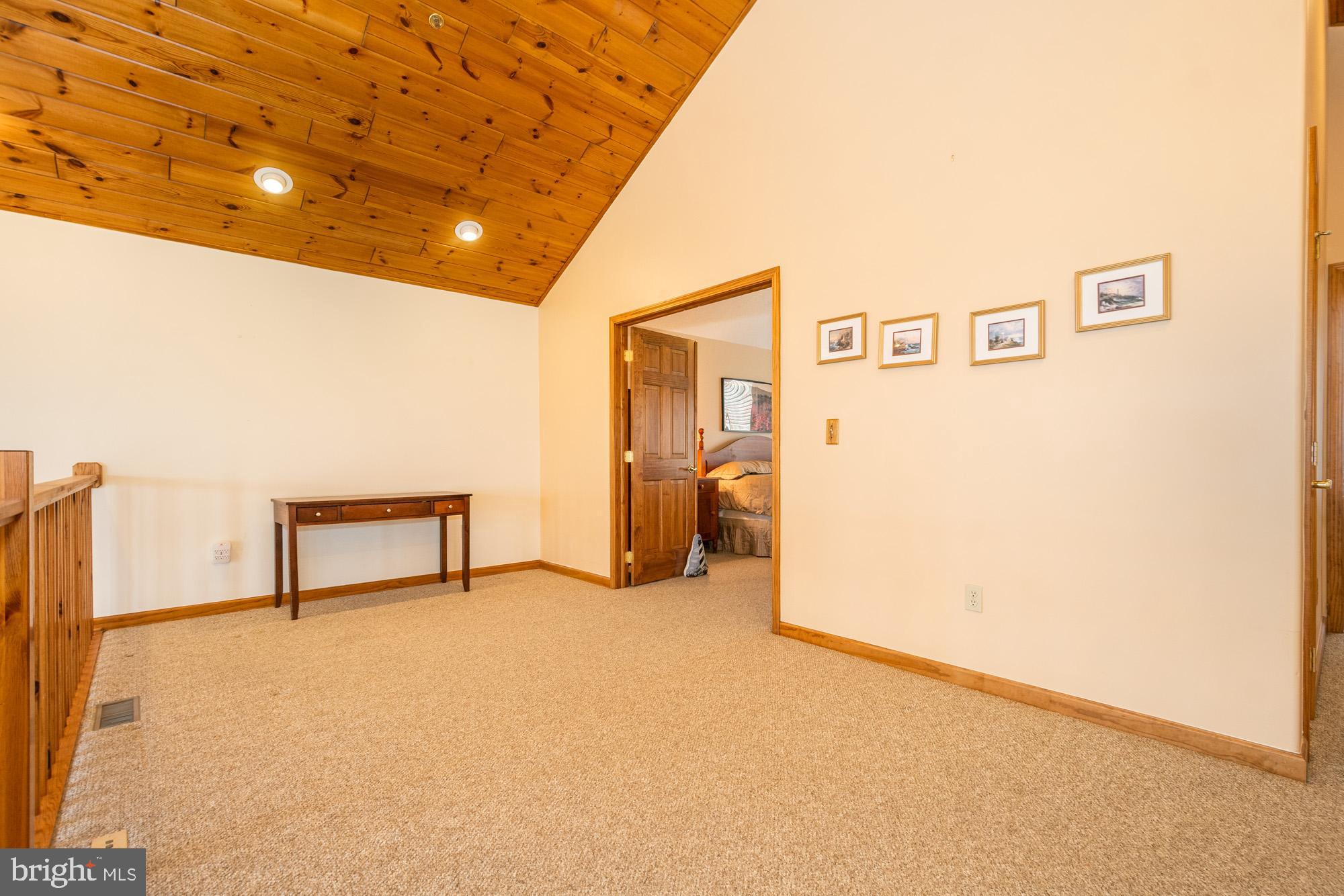 750 Wisp Mountain Road, Unit B McHenry, MD 21541 - Photo 27 of 49 a view of a livingroom with a staircase