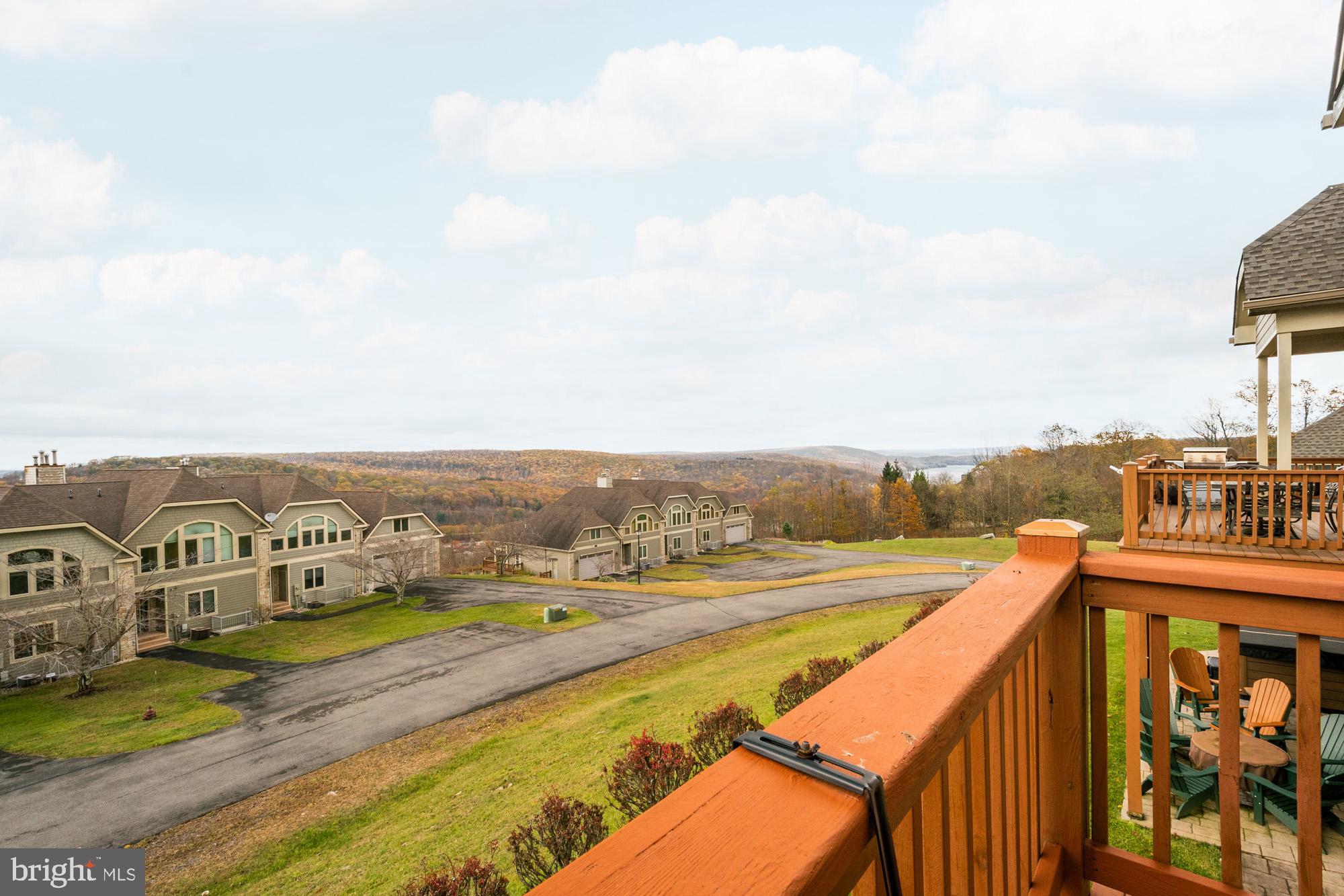 750 Wisp Mountain Road, Unit B McHenry, MD 21541 - Photo 3 of 49 a view of swimming pool with a terrace