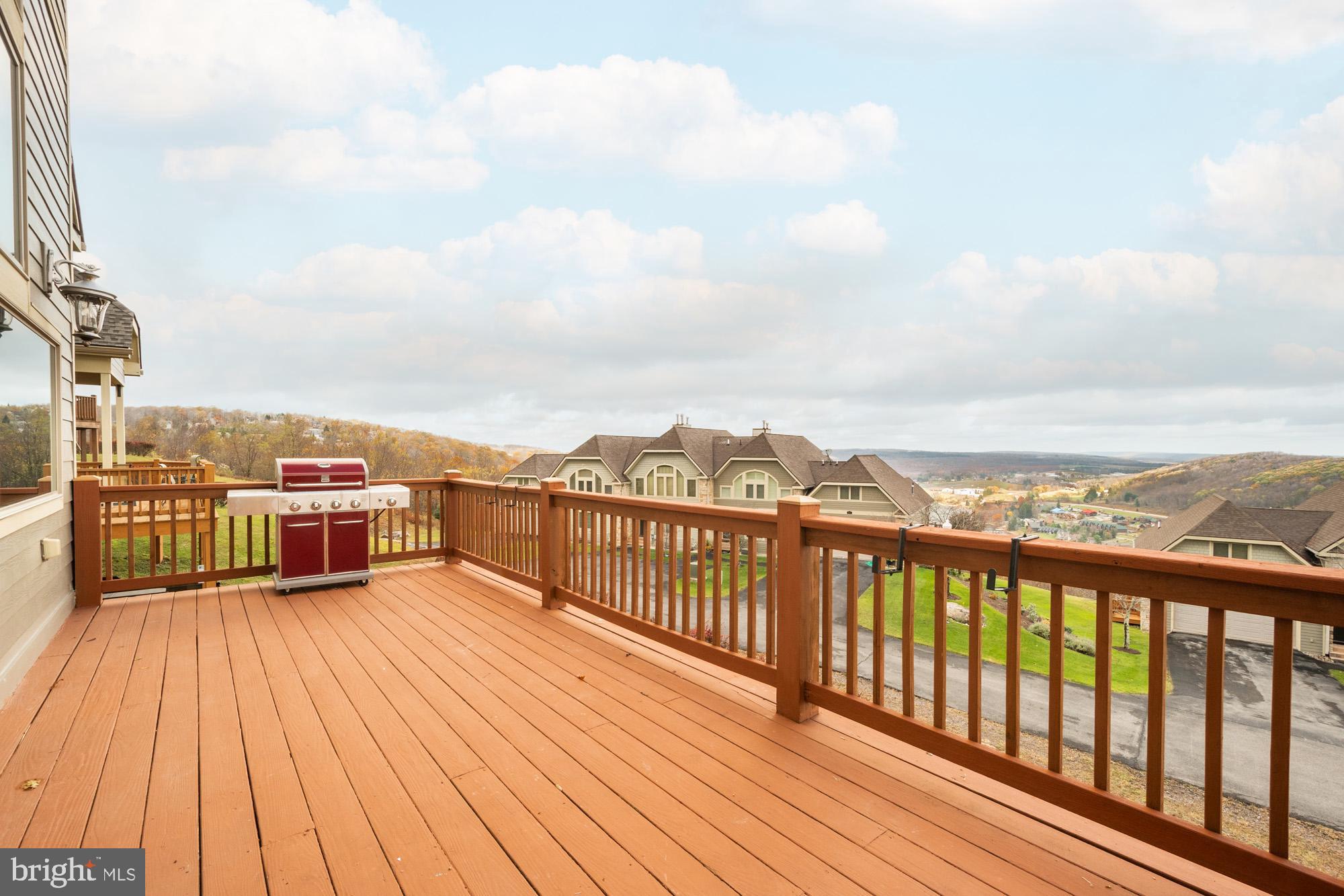 750 Wisp Mountain Road, Unit B McHenry, MD 21541 - Photo 4 of 49 a view of a balcony with city view