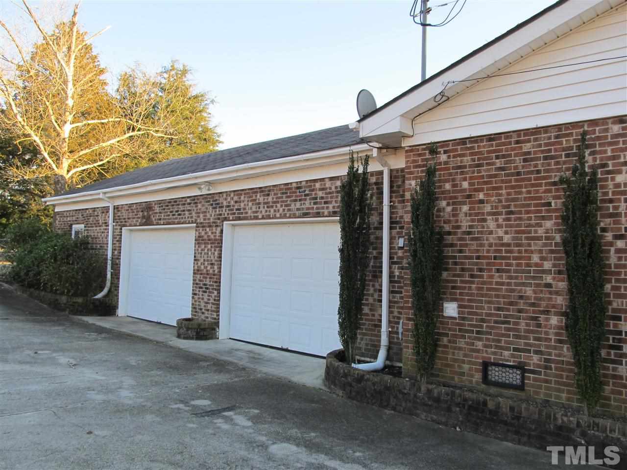 512 Old Stage Road North Coats, NC 27521 - Photo 3 of 18 a view of a house with backyard