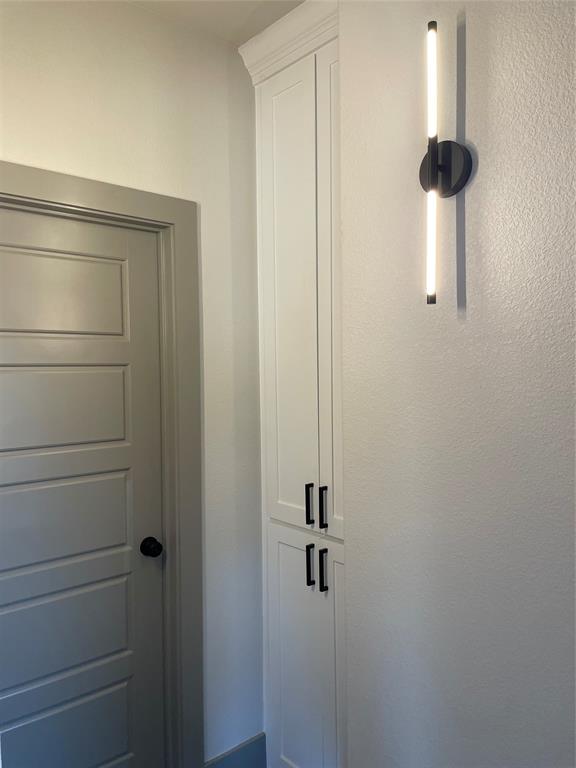 159 Lake Valley Road Sunset, TX 76270 - Photo 21 of 34 Guest Hallway storage, work in progress