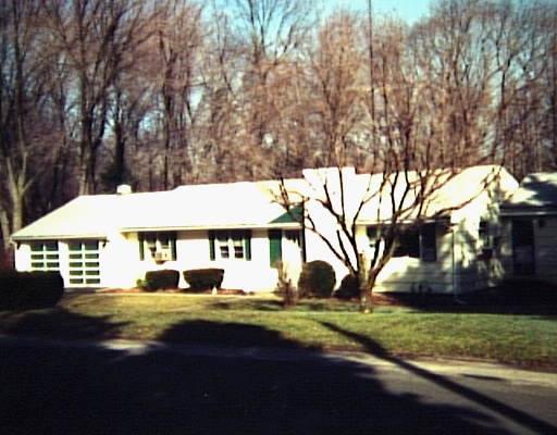 144 Sterling Road Trumbull, CT 06611 - Photo 1 of 1 a view of house with outdoor space and trees around