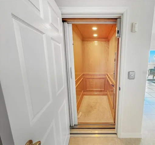 a view of a dinning room with table and a window