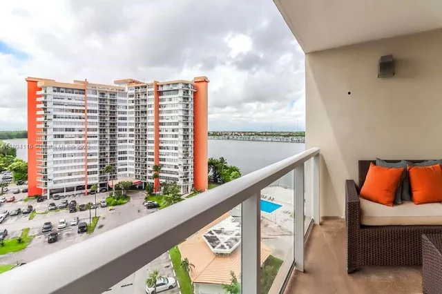 a view of balcony with furniture