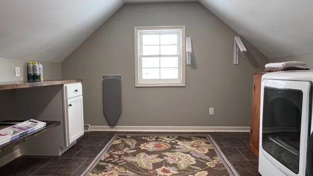 a view of kitchen with granite countertop stove top oven