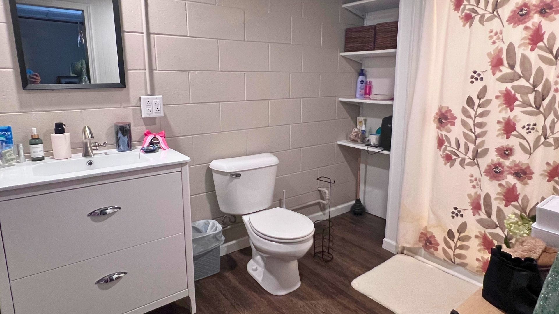 101 West Mill Road Sheffield, IL 61361 - Photo 20 of 26 a bathroom with a toilet sink and mirror