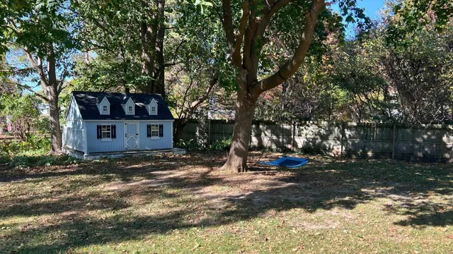 a front view of a house with a glass door