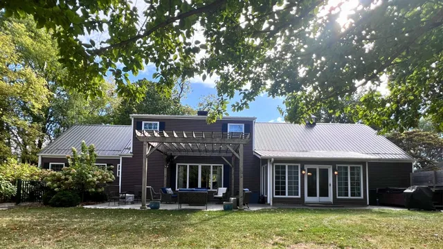 front view of a house with a garden