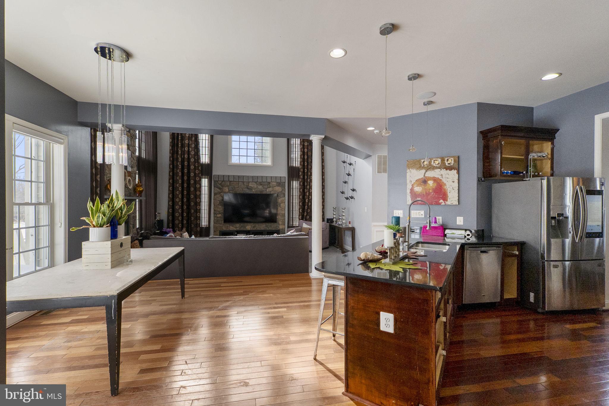 8400 Summit Avenue Baltimore, MD 21244 - Photo 11 of 55 a living room with furniture and a flat screen tv