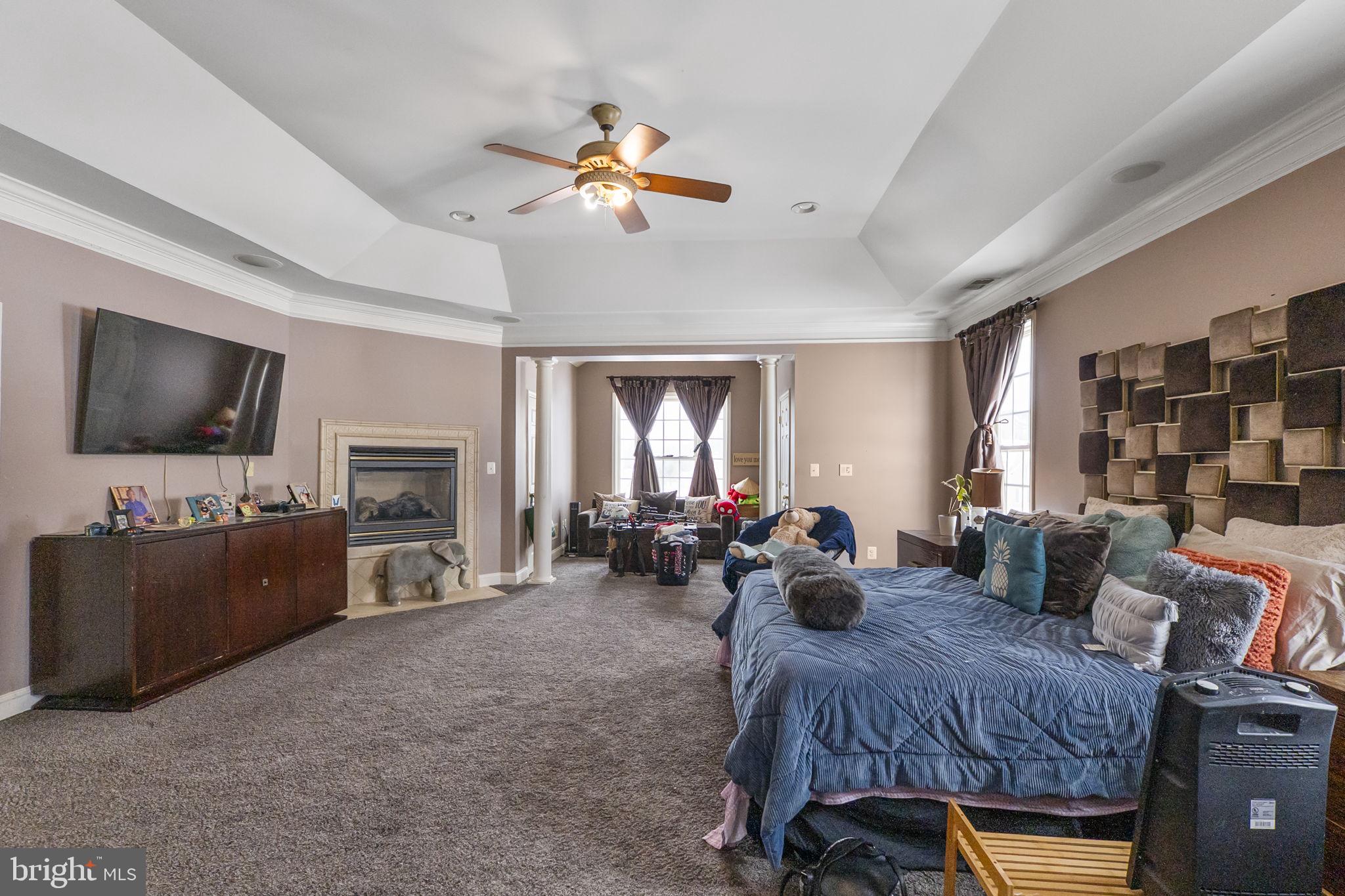 8400 Summit Avenue Baltimore, MD 21244 - Photo 29 of 55 a living room with furniture and a flat screen tv