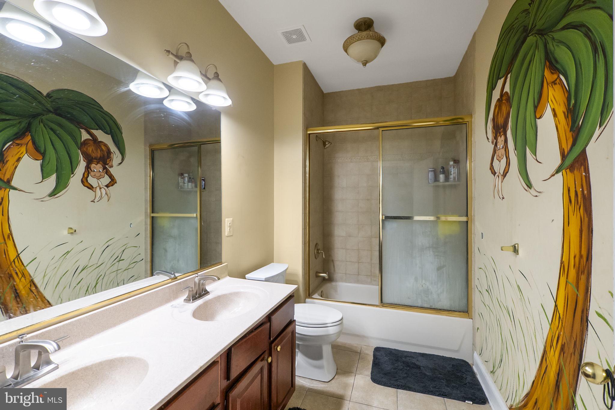 8400 Summit Avenue Baltimore, MD 21244 - Photo 33 of 55 a bathroom with a sink a toilet and shower