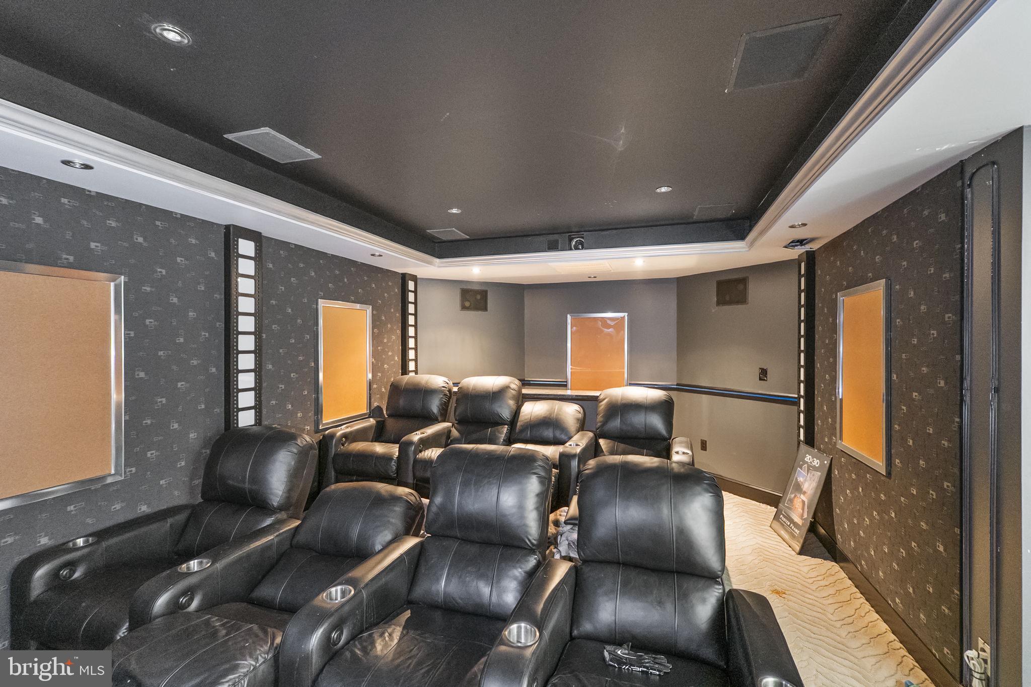 8400 Summit Avenue Baltimore, MD 21244 - Photo 44 of 55 a media room with lots of chairs and wooden floor