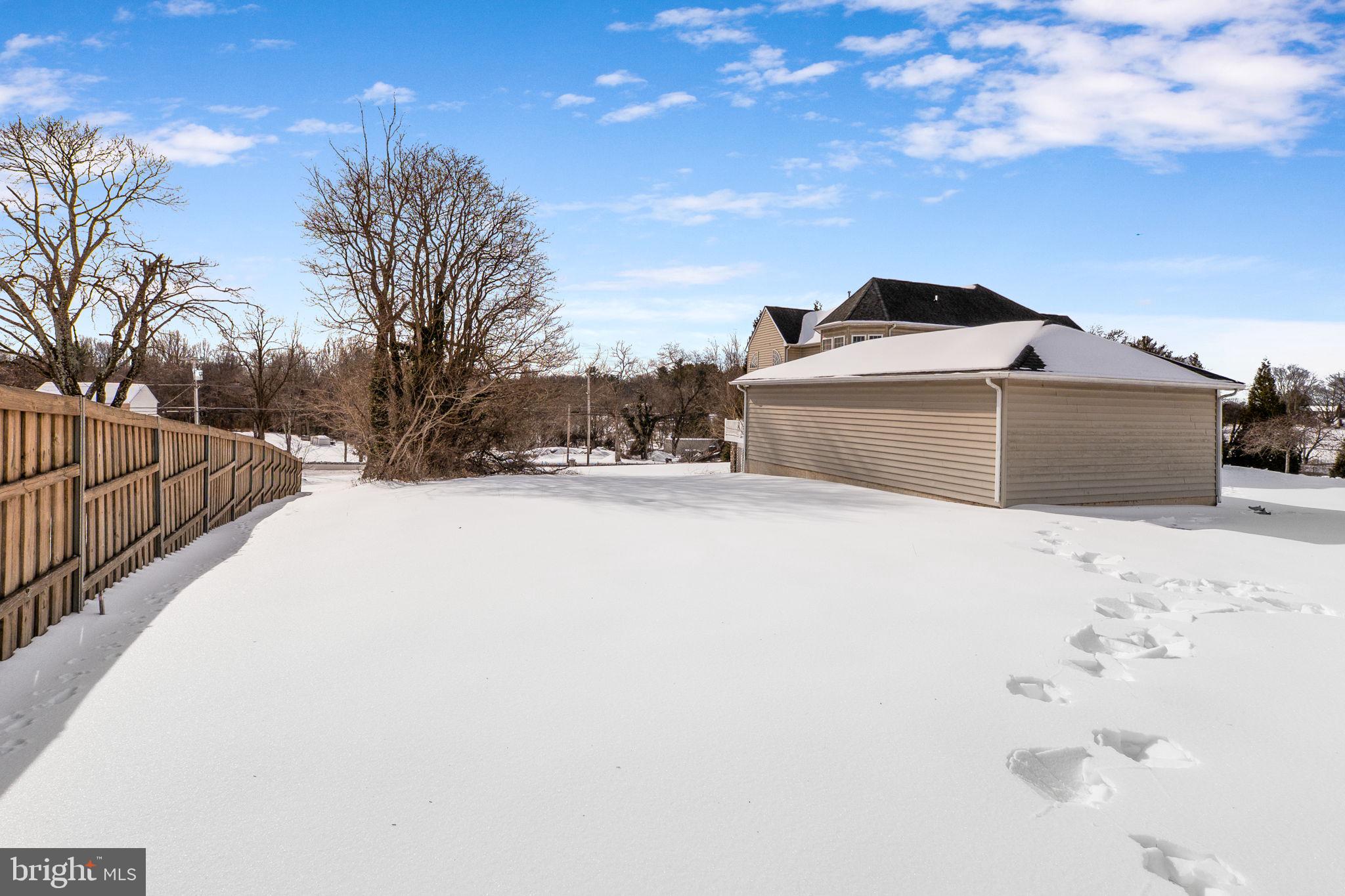 8400 Summit Avenue Baltimore, MD 21244 - Photo 48 of 55 a view of wooden fence and a snow
