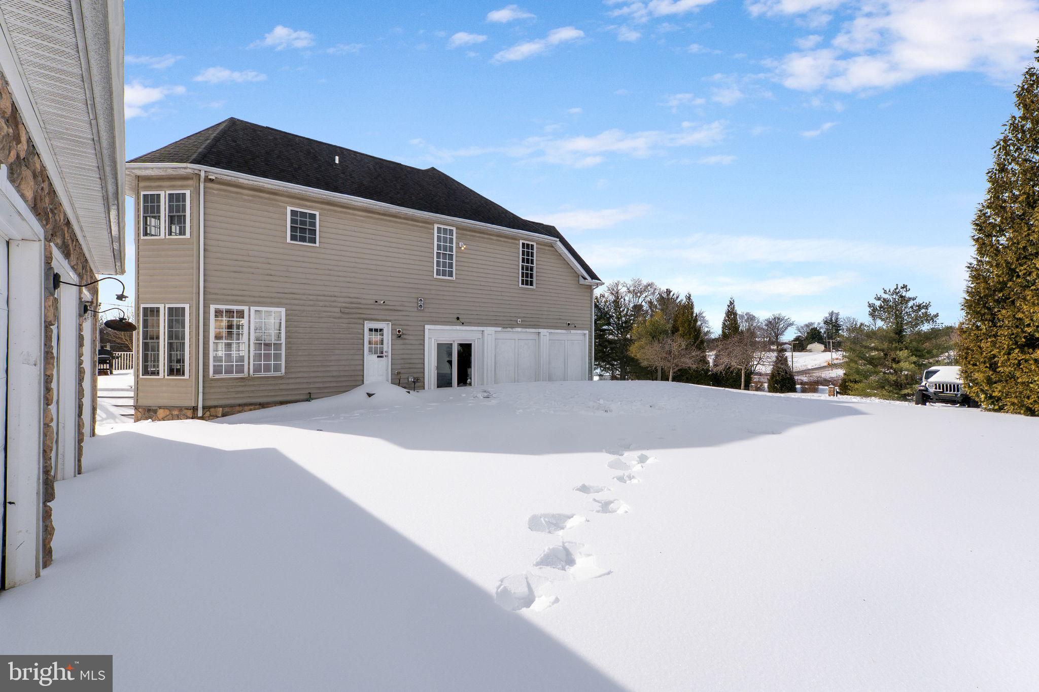 8400 Summit Avenue Baltimore, MD 21244 - Photo 51 of 55 a front view of a house with a yard