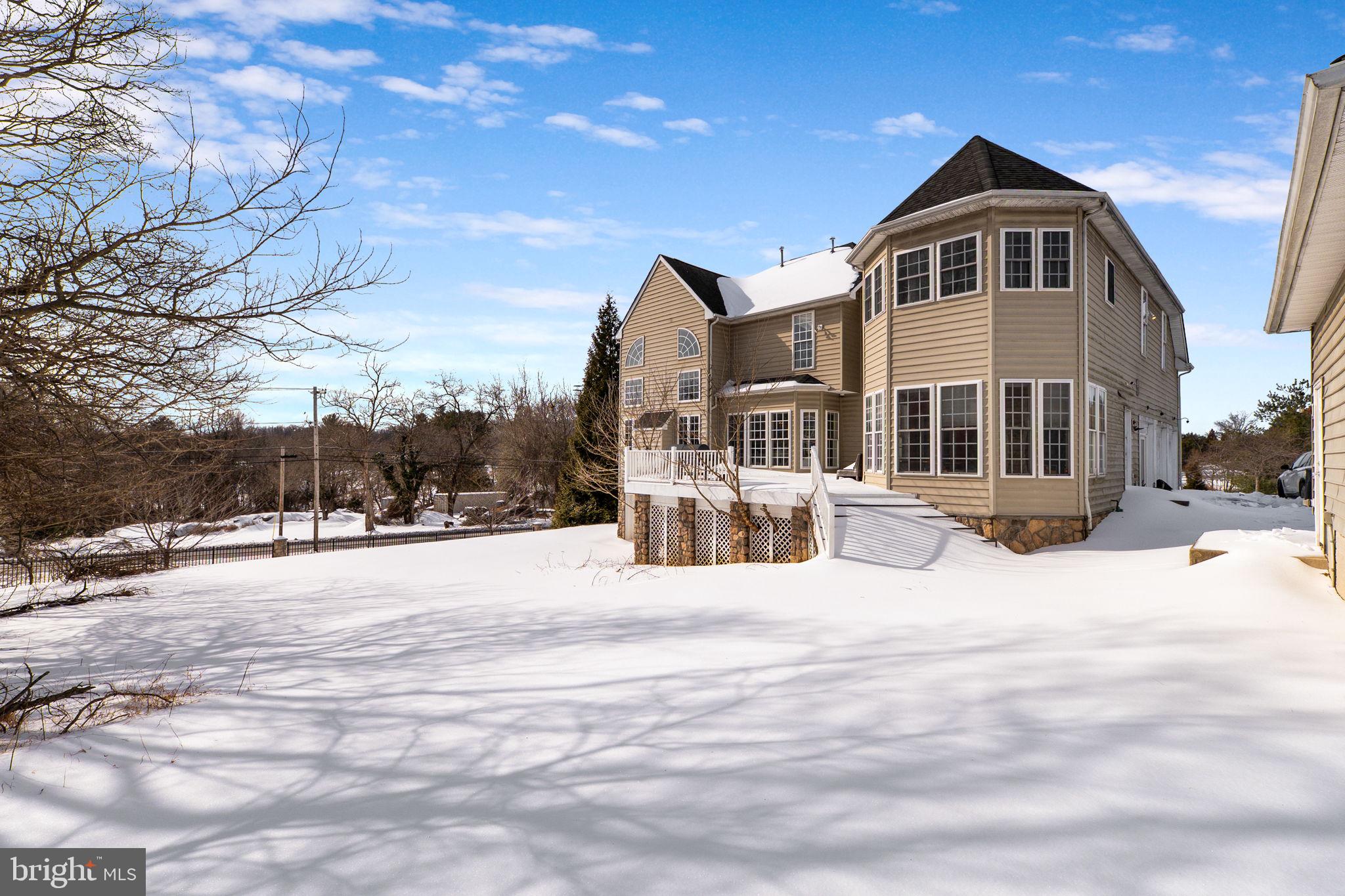 8400 Summit Avenue Baltimore, MD 21244 - Photo 53 of 55 a front view of a house with a yard